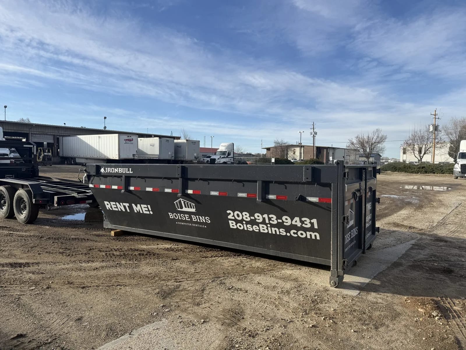 15 yard roll-off dumpster on the delivery truck in Boise, ID - Boise Bins